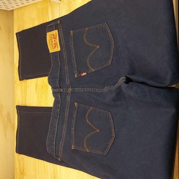 Levi’s Classic Mid Rise Skinny Jeans size 33 Dark wash Cotton Blend Casual - Picture 6 of 8